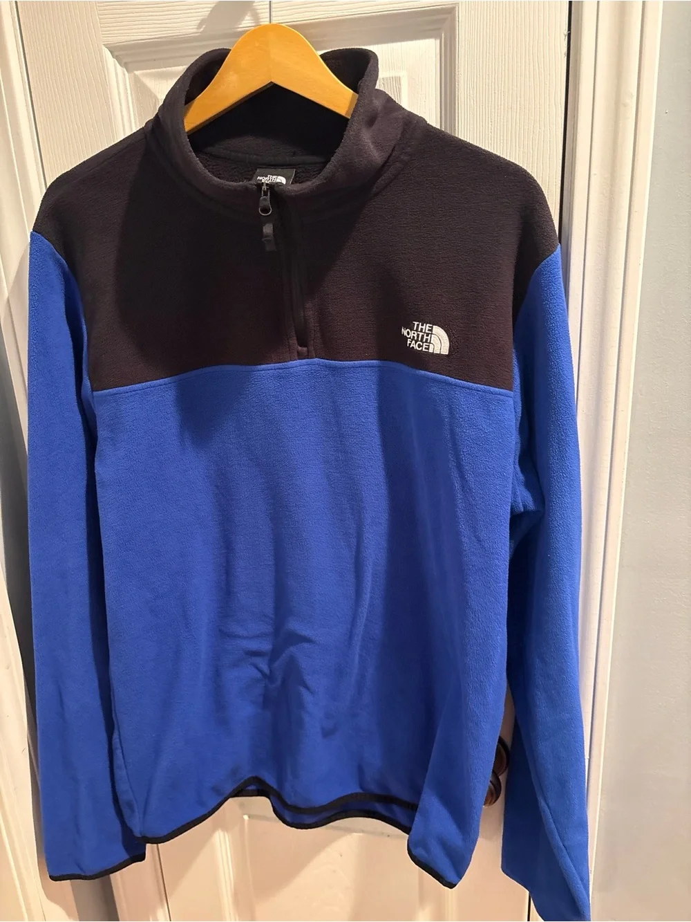 The North Face Black and Blue Fleece 1/4 zip Pullover