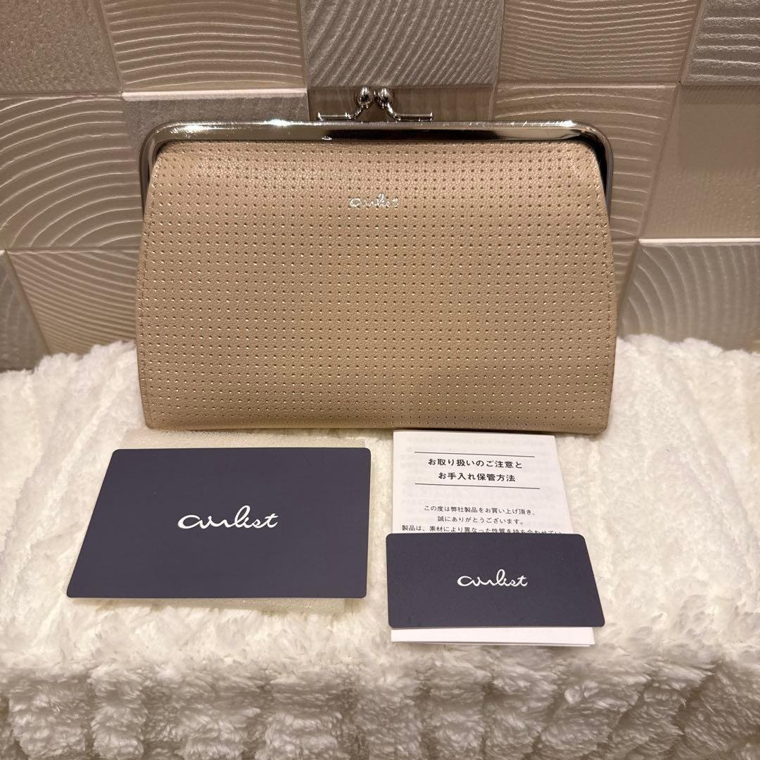 airlist<br>clasp wallet<br>pirika<br>pirika<br>goatskin<br>beige<br>onward<br>onward<br><br>reference